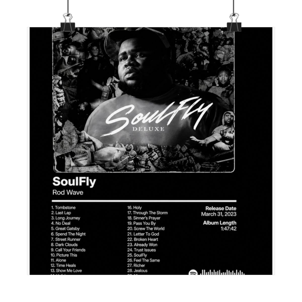A framed black and white poster of the "SoulFly Deluxe" album by Rod Wave. The poster displays the album title, artist, tracklist, release date, and album length. The image is set against a dark... - alternate angle 5, merchandise