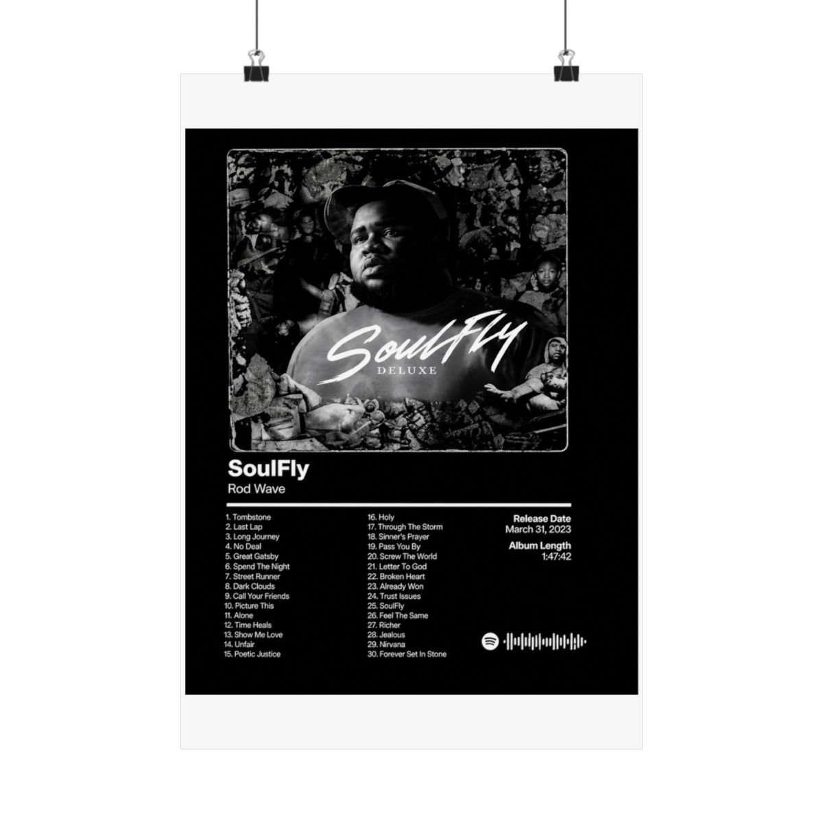 A framed black and white poster of the "SoulFly Deluxe" album by Rod Wave. The poster displays the album title, artist, tracklist, release date, and album length. The image is set against a dark... - alternate angle 3, merchandise
