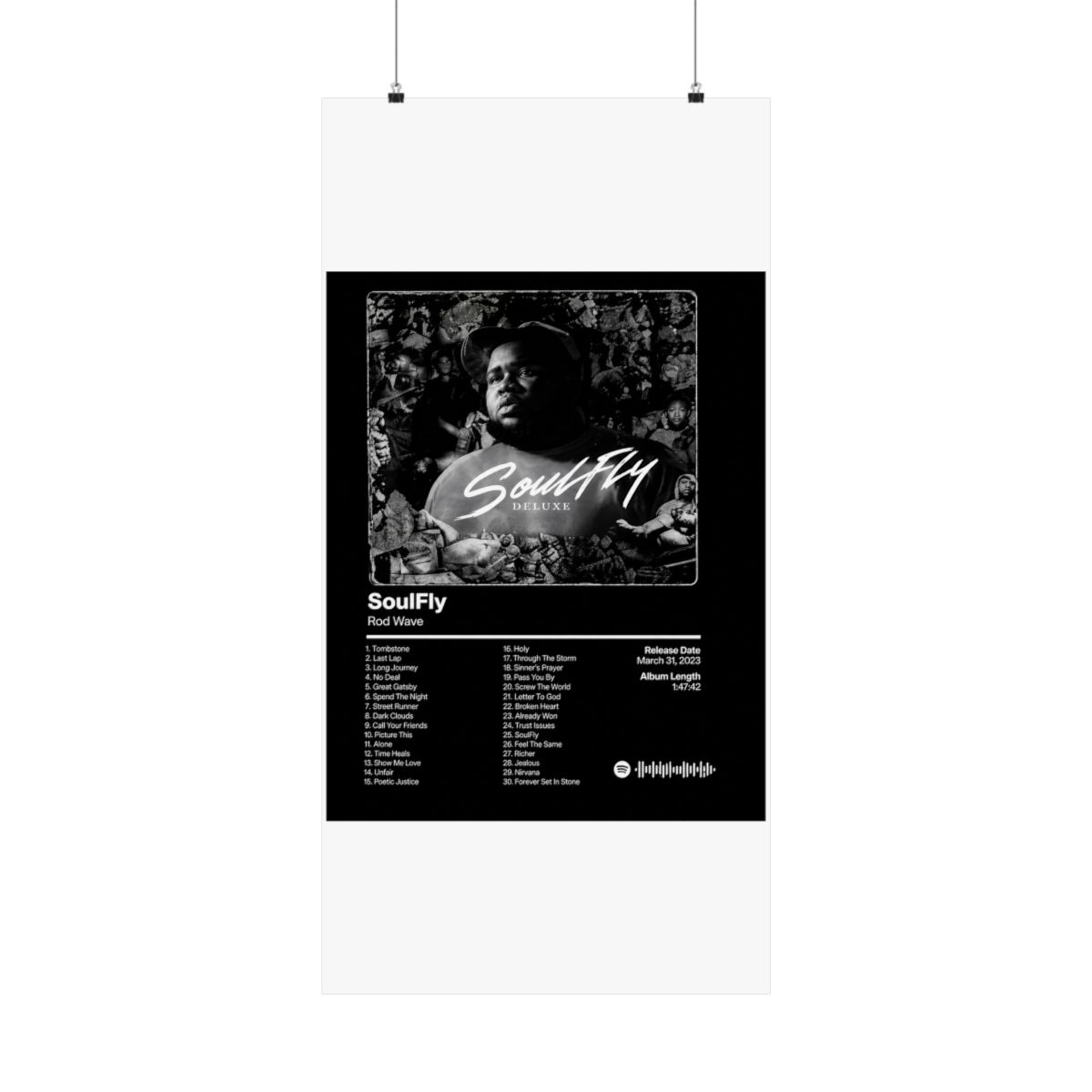 A framed black and white poster of the "SoulFly Deluxe" album by Rod Wave. The poster displays the album title, artist, tracklist, release date, and album length. The image is set against a dark... - alternate angle 2, merchandise
