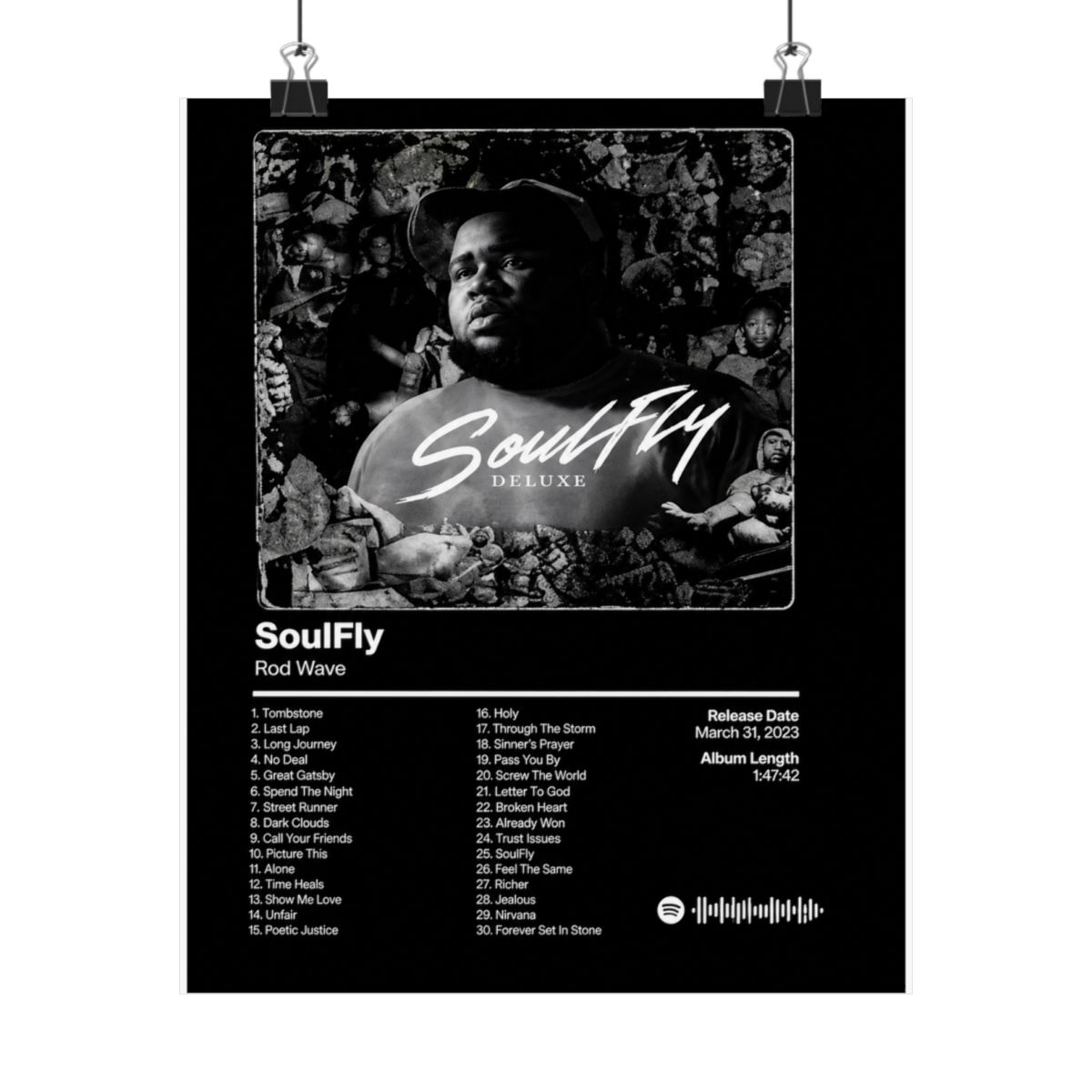 A framed black and white poster of the "SoulFly Deluxe" album by Rod Wave. The poster displays the album title, artist, tracklist, release date, and album length. The image is set against a dark... - alternate angle 1, merchandise